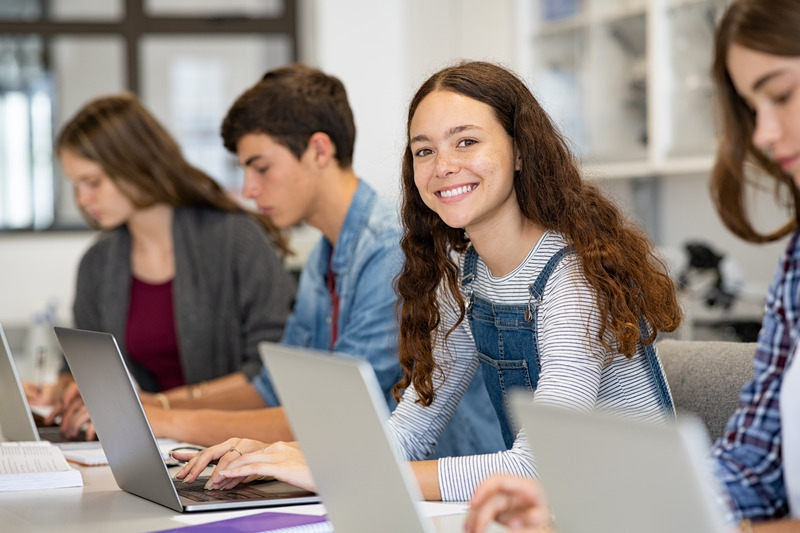 Young patient smiling at school with better oral health