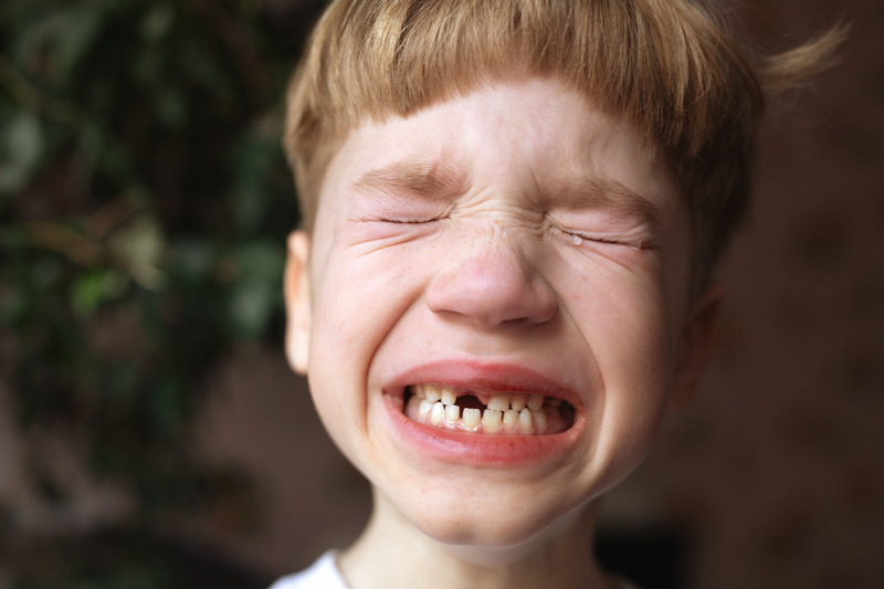 Child with a knocked-out-tooth